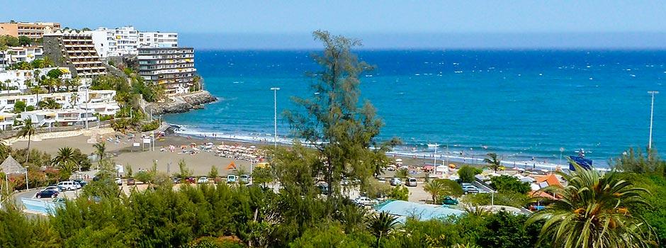 Paseo marítimo de la Playa de San Agustín con restaurantes y el Atlántico al fondo, Gran Canaria sur